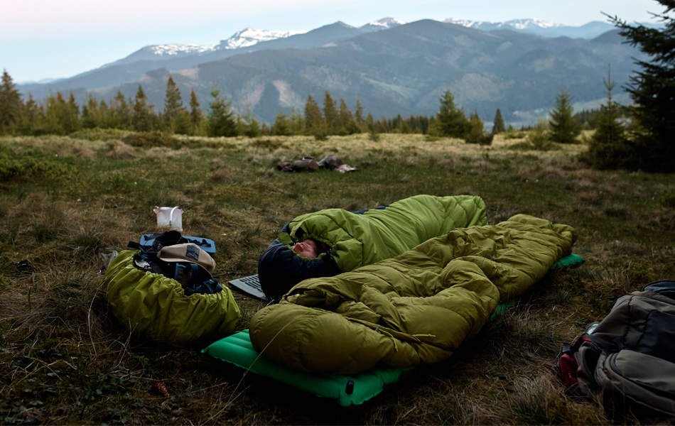 man in sleeping pad for camping & backpacking faq