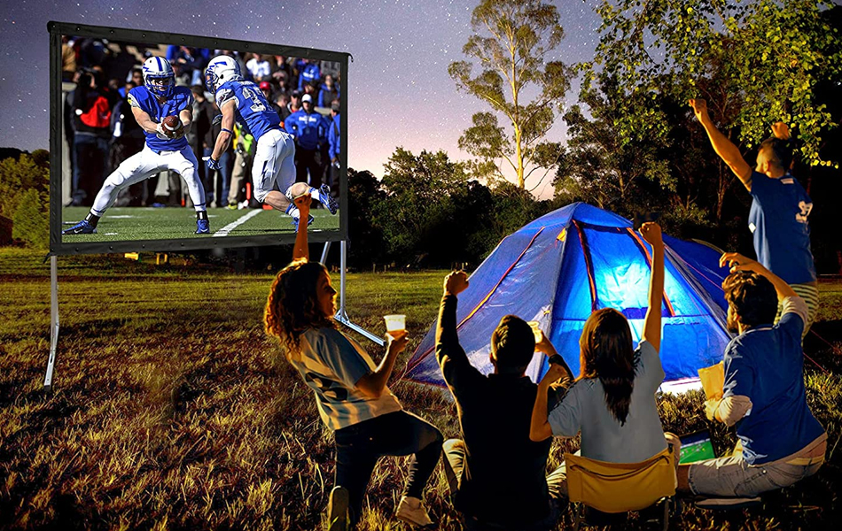 people watching a game on outdoor movie screen